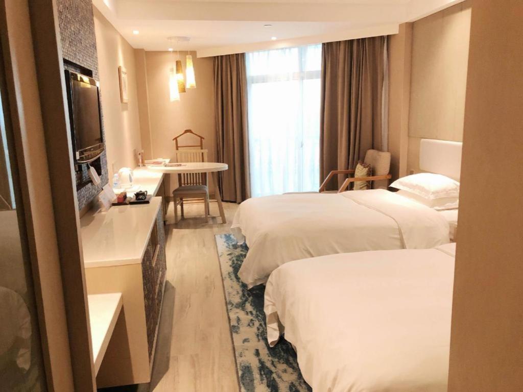 Excemon Beach Hotel Beihai Bagian luar foto