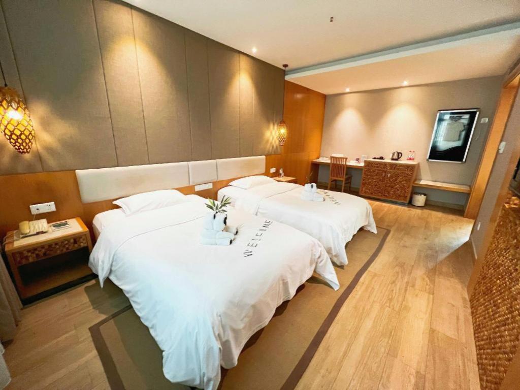 Excemon Beach Hotel Beihai Bagian luar foto