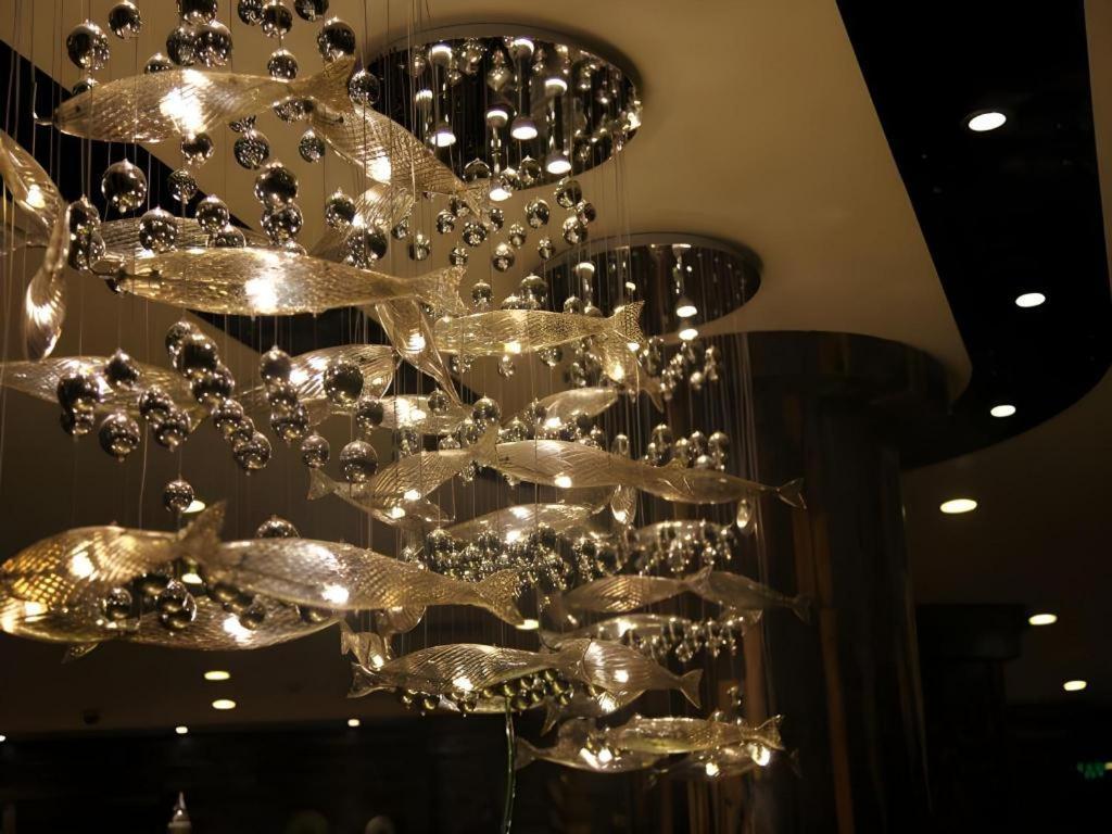 Excemon Beach Hotel Beihai Bagian luar foto